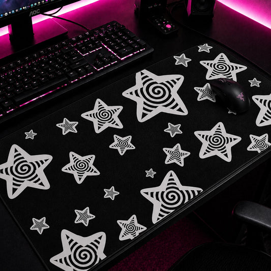 Black and white aesthetic gaming mousepad featuring hypnotic spiral stars scattered across a dark background. Extended desk mat with y2k, indie, grunge, and alternative aesthetic, perfect for gaming setups, home offices, and modern desk decor.