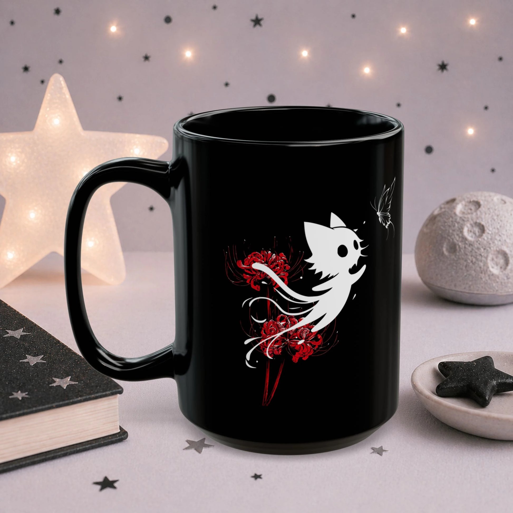Gothic black coffee mug with white ghost cat artwork, red spider lily flowers and butterfly illustration, spooky cute anime style drinkware.