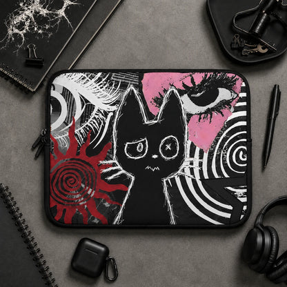 Alternative gothic laptop sleeve with black cat illustration, red and white grunge elements, spiral artwork, and dark aesthetic design. Protective padded laptop case displayed in a realistic product mockup for gothic and emo desk setups.