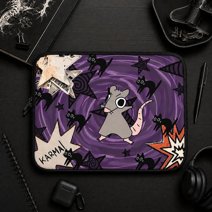 Gothic rat laptop sleeve with black cats, purple swirl background and grunge artwork, aesthetic laptop case flat lay surrounded by dark desk accessories and alternative stationery.