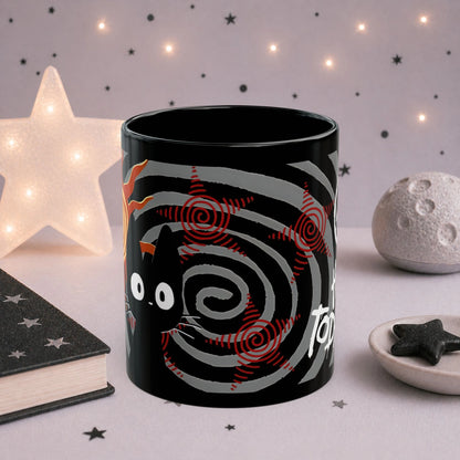 Black cat grunge mug close-up, bold trippy sunshine and chaos art on dark aesthetic ceramic coffee cup