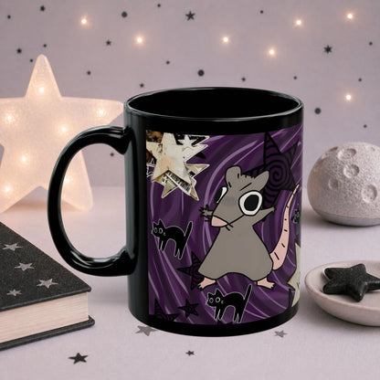 Gothic rat mug with purple grunge background, black cats, celestial stars and alternative spooky artwork, black ceramic coffee mug displayed in a dreamy aesthetic setting.