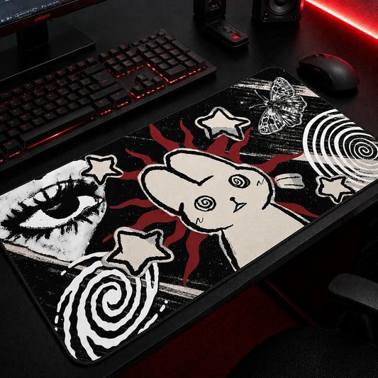 Black and red gothic aesthetic gaming mousepad featuring a cute bunny illustration, grunge eye artwork, spiral patterns, stars, and butterfly accents, oversized desk mat for alternative and dark-themed gaming setups.