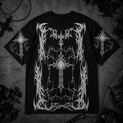 Black oversized gothic t-shirt featuring intricate white cross artwork, black metal inspired graphics and alternative streetwear aesthetic.