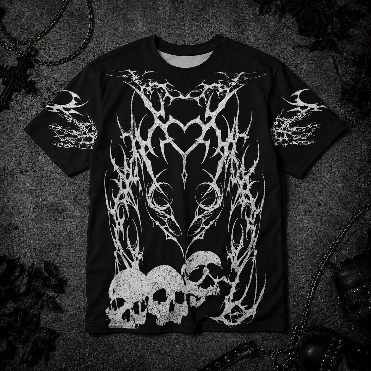 Black gothic oversized t-shirt featuring tribal heart artwork, distressed skull graphics and dark alternative aesthetic.