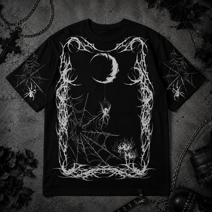 Black gothic spider web t-shirt featuring crescent moon artwork, hanging spider illustration and dark alternative aesthetic design.
