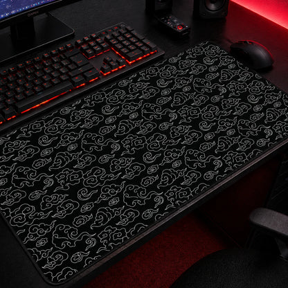 Black Japanese cloud pattern gaming mousepad featuring elegant white cloud line art inspired by traditional Japanese motifs, minimalist oversized desk mat with stitched edges for gaming and aesthetic desk setups.