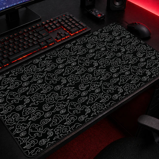 Black Japanese cloud pattern gaming mousepad featuring elegant white cloud line art inspired by traditional Japanese motifs, minimalist oversized desk mat with stitched edges for gaming and aesthetic desk setups.