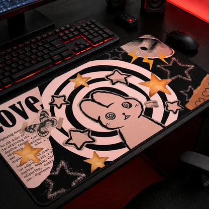 Pastel goth bunny gaming mousepad featuring a cute hypnotic rabbit, spiral background, stars, butterfly collage elements, and soft pink aesthetic. Large extended desk mat perfect for kawaii setups, alternative room decor, gaming desks, and pastel goth accessories.