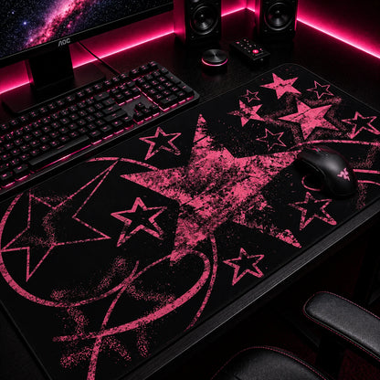 Pink and black grunge gaming mousepad featuring distressed star graphics, abstract splatter effects, and alternative aesthetic artwork. Extended desk mat with pastel goth, y2k, emo, and indie style, perfect for gaming setups, workspaces, and trendy desk decor.