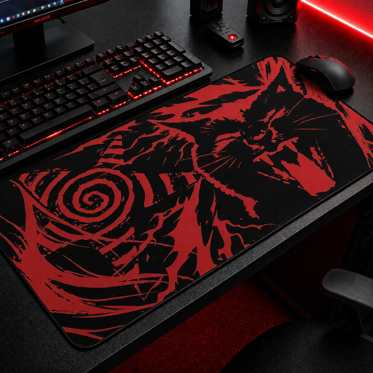 Red and black gothic gaming mousepad featuring a bold black cat illustration with grunge brushstroke effects and hypnotic spiral design. Extended desk mat with alternative aesthetic, dark academia vibes, embroidered edges, and smooth surface for gaming, work, and gothic room decor.