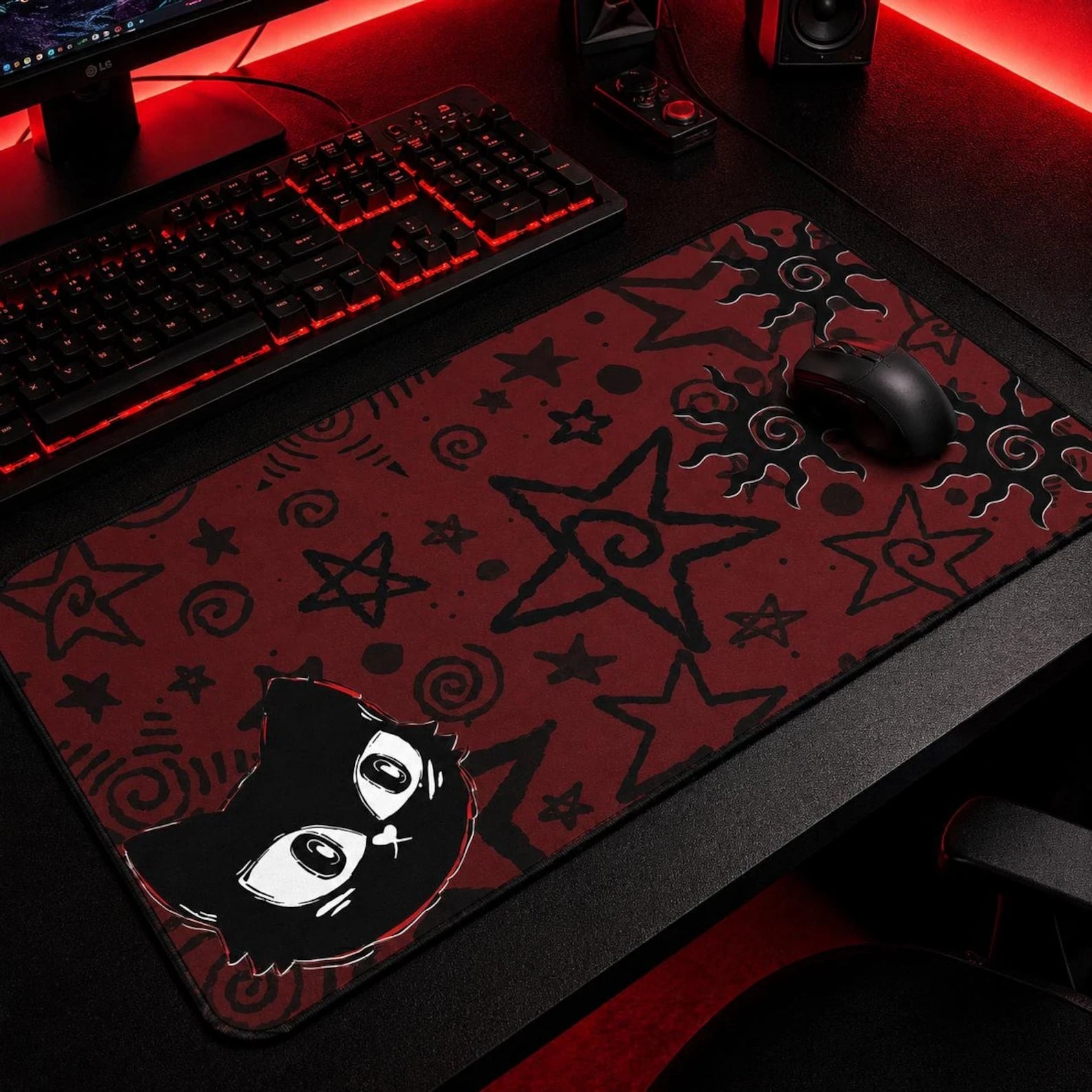 Red and black goth cat gaming mousepad featuring a cute black cat illustration, hand-drawn stars, spirals, and celestial doodles. Alternative aesthetic desk mat perfect for gothic room decor, witchy gaming setups, emo accessories, and dark kawaii desk spaces.