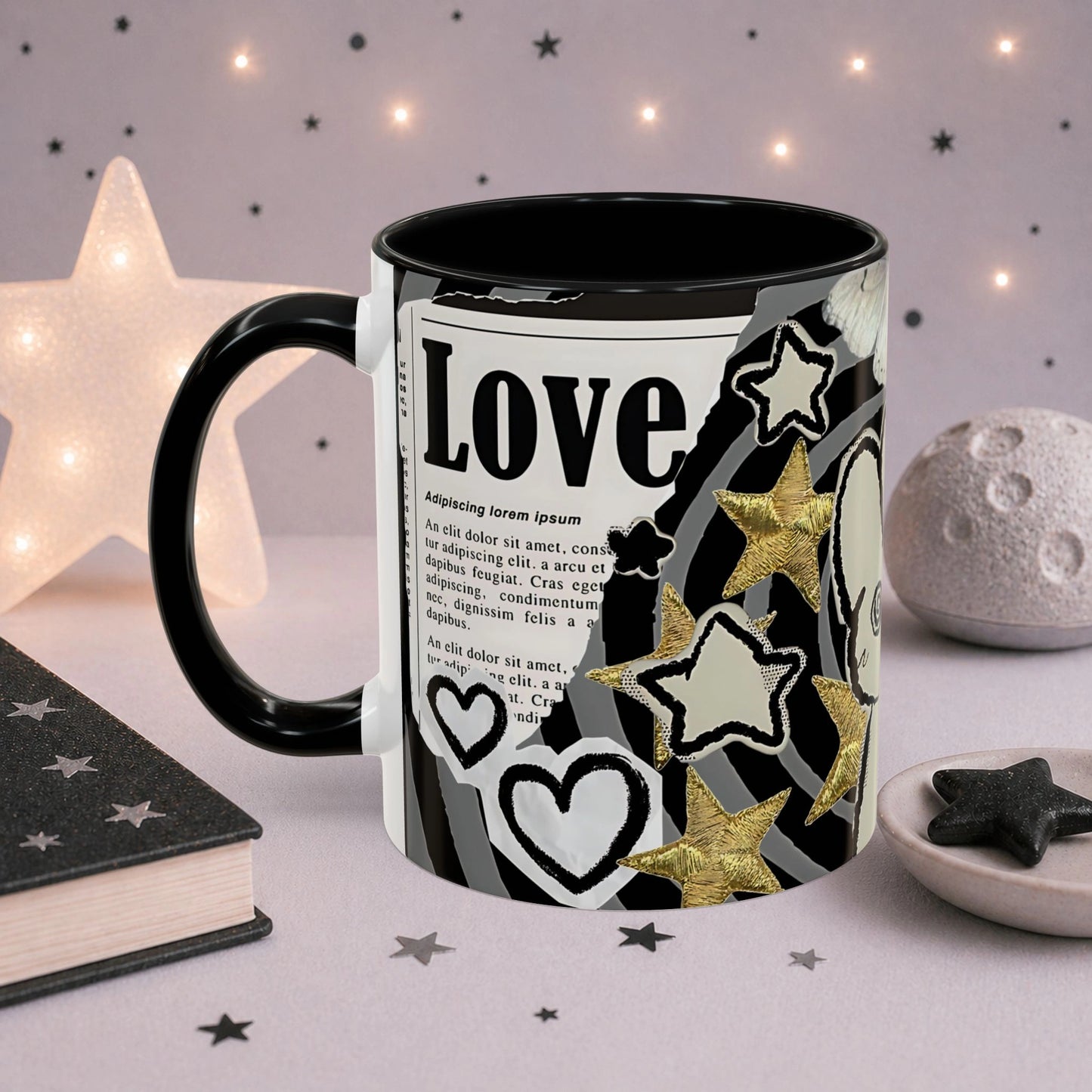 Alternative weirdcore mug with heart doodles, gold stars, newspaper collage elements and black handle shown from angled view.